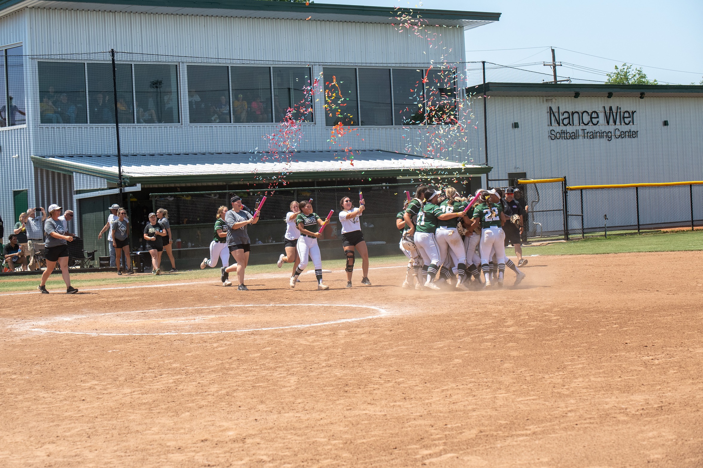 popping confetti on the field.